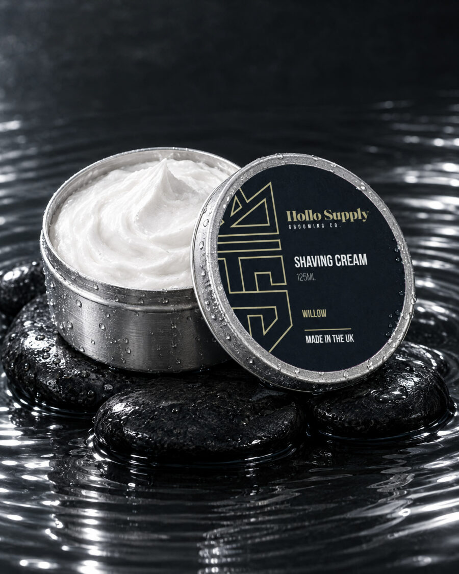 Shaving Cream (Willow) by Hollo Supply Grooming Co., photographed on wet charcoal stone with water