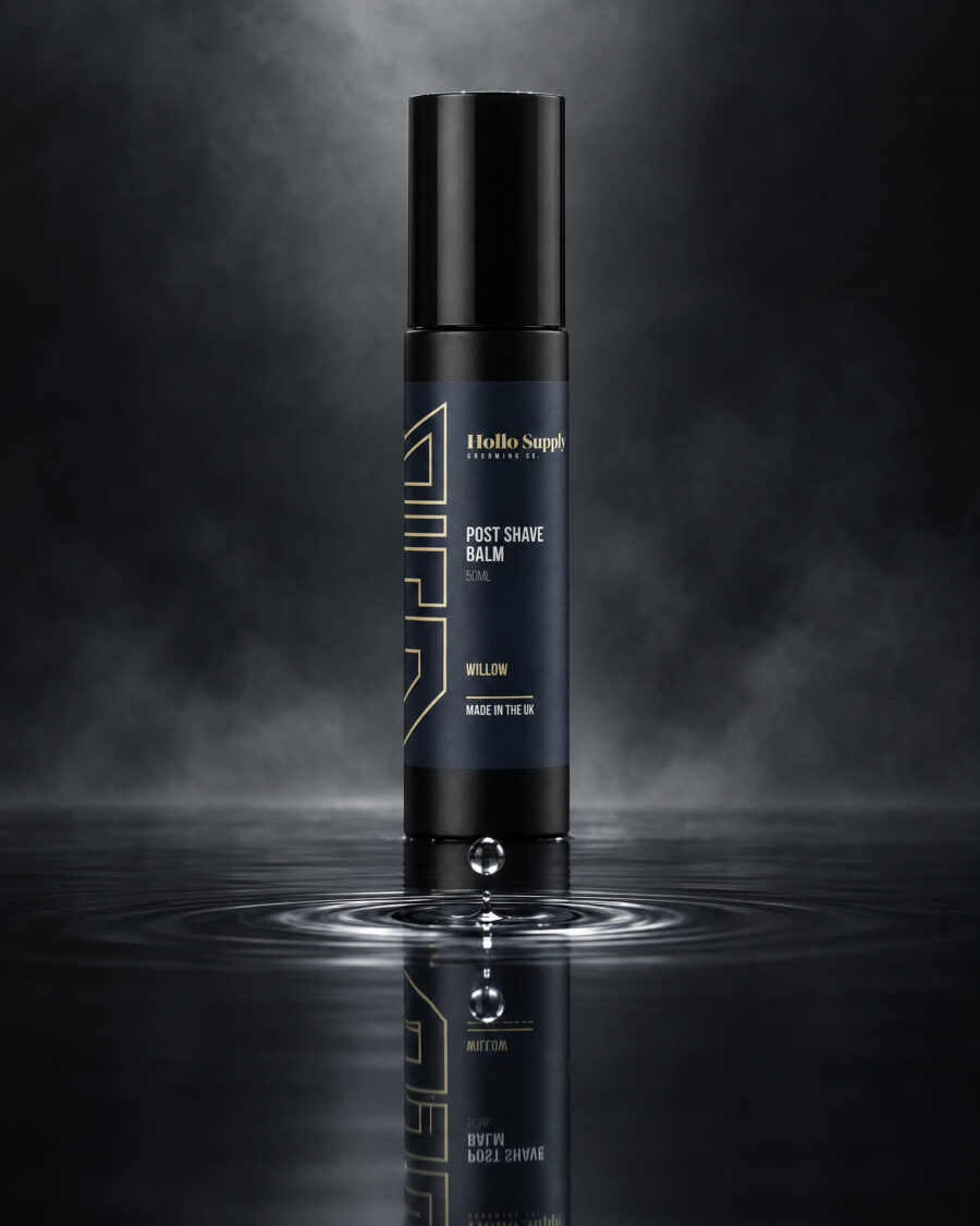 Post Shave Balm (Willow) by Hollo Supply Grooming Co., photographed on wet charcoal stone with water