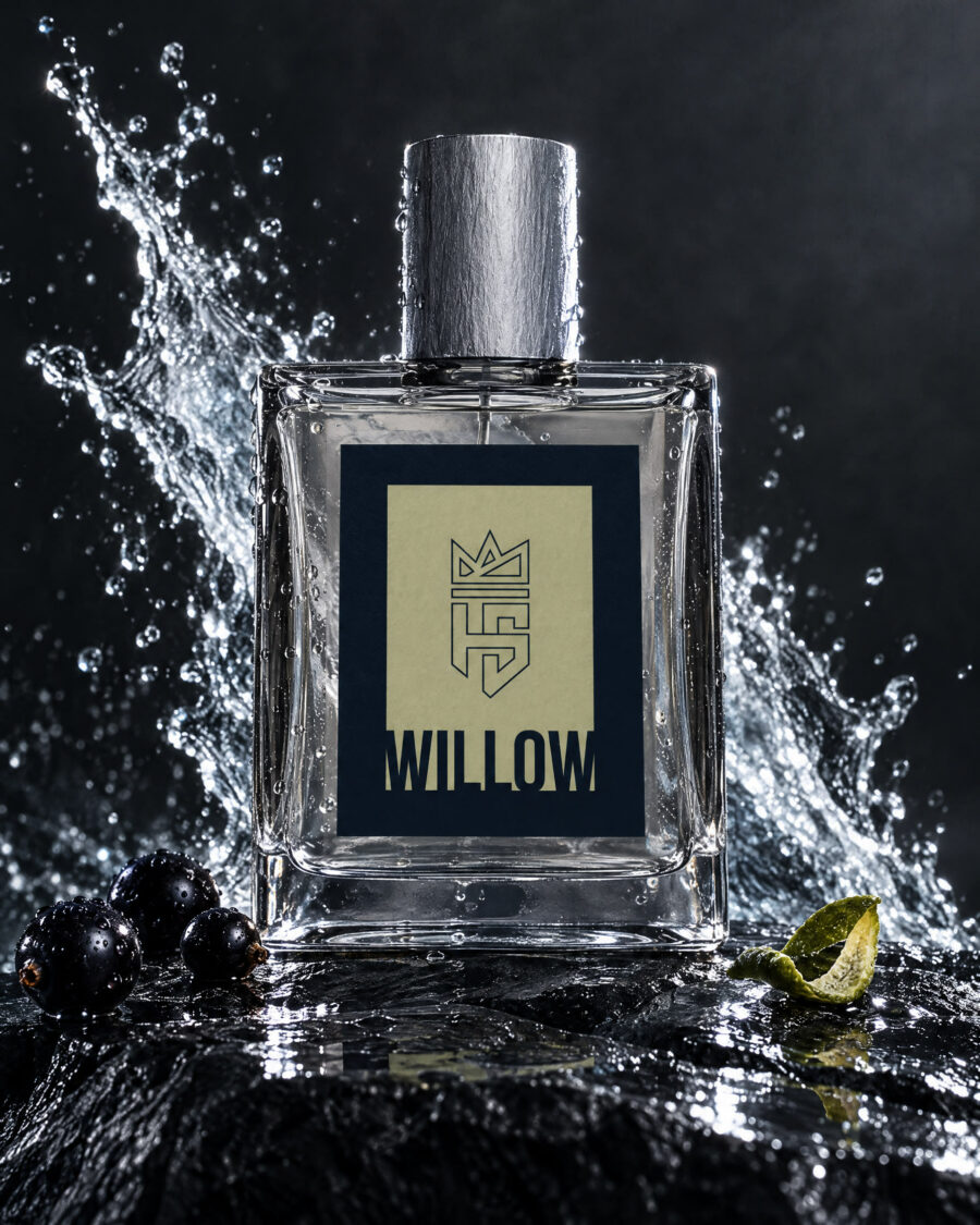 Willow Cologne by Hollo Supply Grooming Co., photographed on wet charcoal stone with water